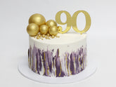 90th Birthday Streaks and Spheres Milestone Cake - The Cake People